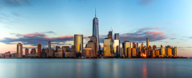 Frozen A long exposure panorama of downtown New York skyline during a beautiful sunset. hudson stock pictures, royalty-free photos & images