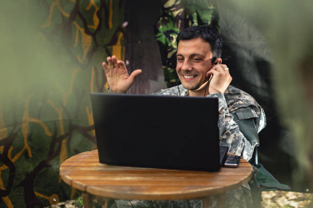 istock Soldier chatting with family 968431652