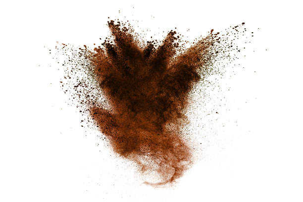 istock abstract brown dust explosion on white background. abstract brown  powder splattered on white background, Freeze motion of brown  powder splashing. 968431862