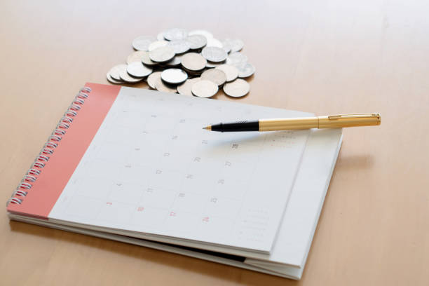 istock Coin,pen,and calendar 968445820