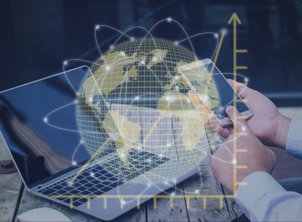 istock businessman using mobile phone and laptop with global network connection hologram and graph diagram business growth up on strategy future planning concept. 968446590