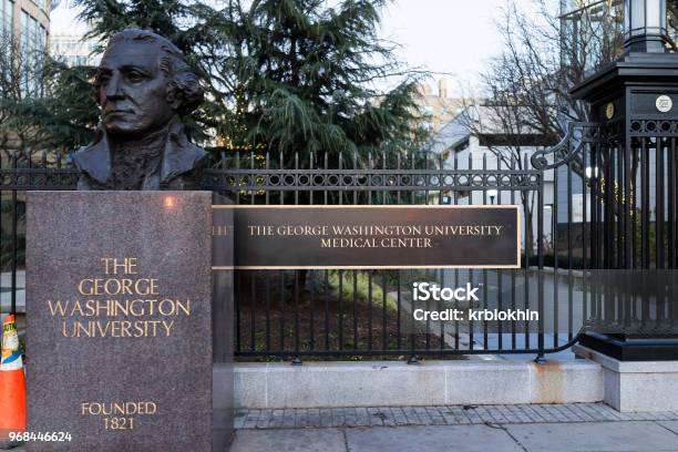 George Washington University Medical Center With Statue Sign And Date Founded Entrance In Evening Stock Photo - Download Image Now