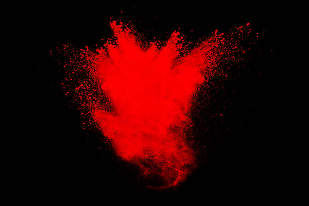 istock abstract red powder explosion on black background. abstract red dust splattered on background. Freeze motion of red powder splashing. 968446664