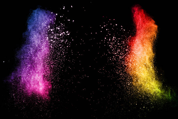 istock Multi color powder explosion isolated on black background. Colored dust splash cloud on black background. Launched colorful particles on background. Painted Holi. 968446680