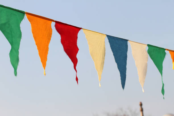 istock Colored flags on a blue sky background. Third gender concept. Istanbul convention concept. Flags. 968451694