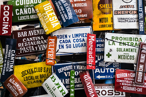 Buenos Aires, Argentina - February 05, 2017: Collection of information signs in Spanish language are seen in the San Telmo neighborhood in the Argentine capital, Buenos Aires.