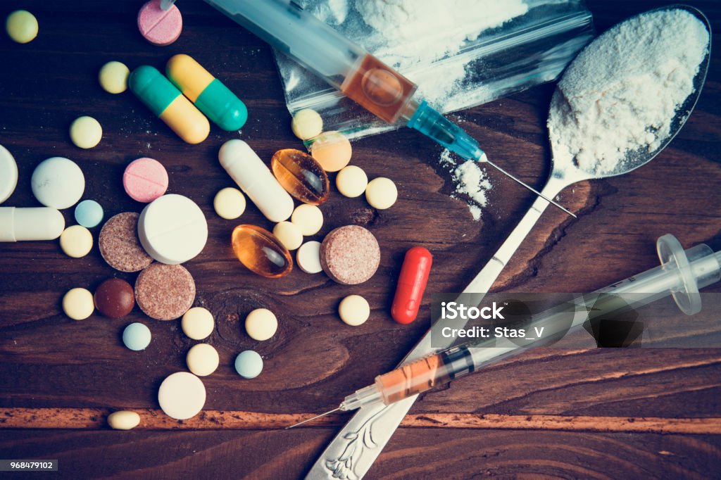 Drug concept. Use illicit Drug abuse .Addiction heroin.Injection, doping. Opium epidemic. Toning, selective focus. Narcotic Stock Photo