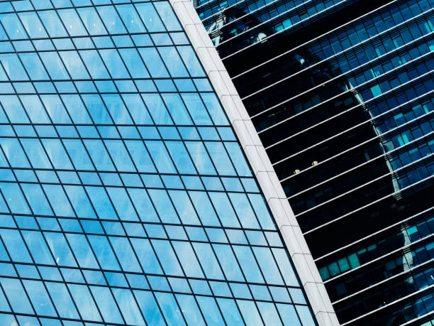 istock Details of skyscrapers reflecting the sky 968479410