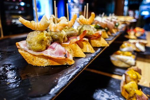 Spanish Pintxos (Pincho) from the Basque region of Bilbao and San Sebastian.\n\nA typical snack of the Basque Country and Navarre, \