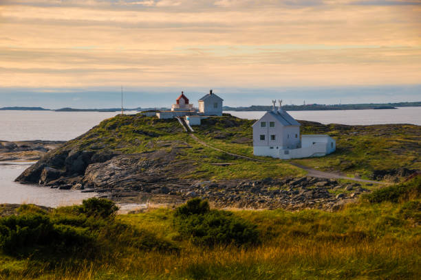 istock Lighthouse at coast Norway sunset landscape 968492164