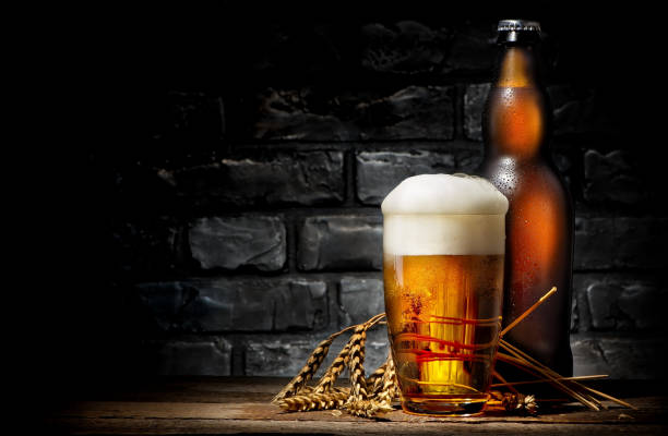 istock Beer in glass and bottle 968492618
