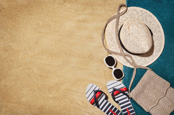 istock Top view towel on sandy beach. Background with copy space 968502838