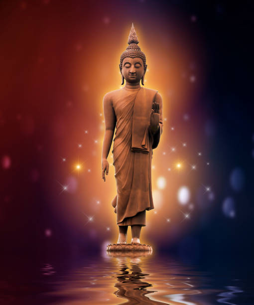 istock Buddha statue on water gold background purple color blue 968506658