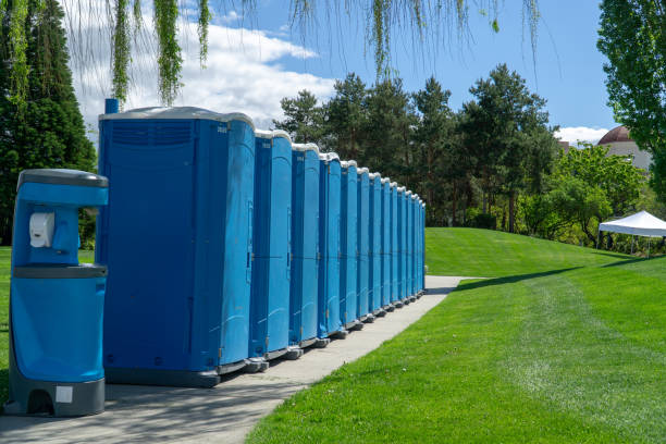 Porta Poties Lined up for an Event Portable Restrooms setup for an upcoming event portability stock pictures, royalty-free photos & images