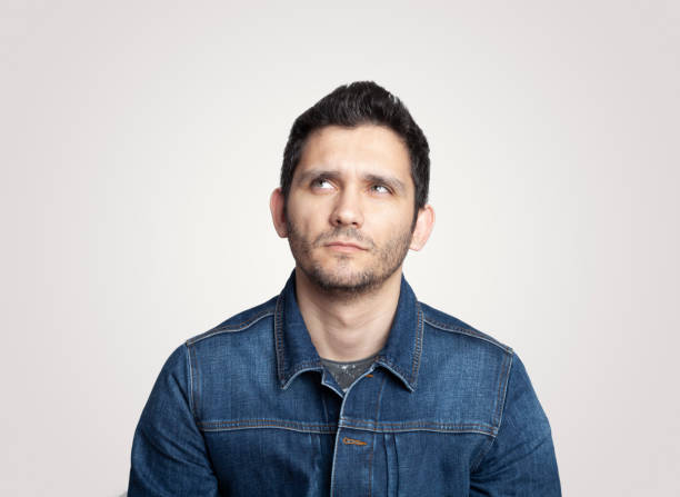 istock Portrait of a thoughtful young man 968526542
