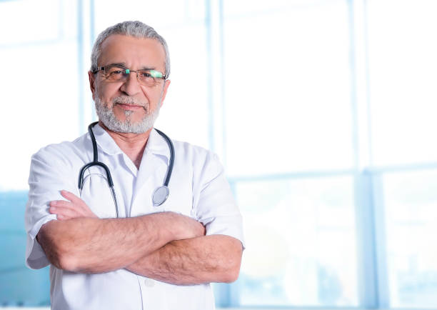 istock Senior Doctor looking at the camera and smiling 968532732