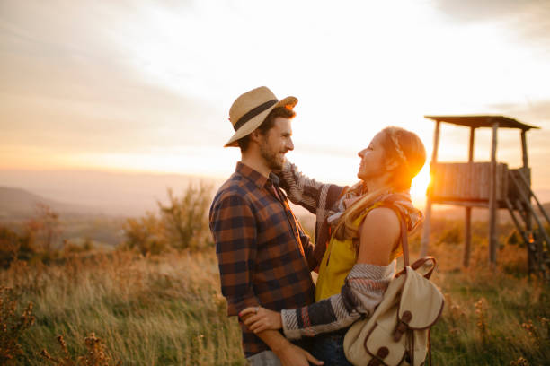 istock Young romantic couple having fun outdoors 968533606