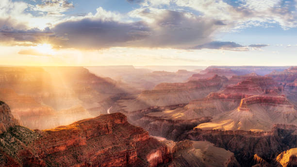 Grand Canyon Sunset from Hopi Point during summer monsoon Dramatic summer sunset with rain showers south rim stock pictures, royalty-free photos & images