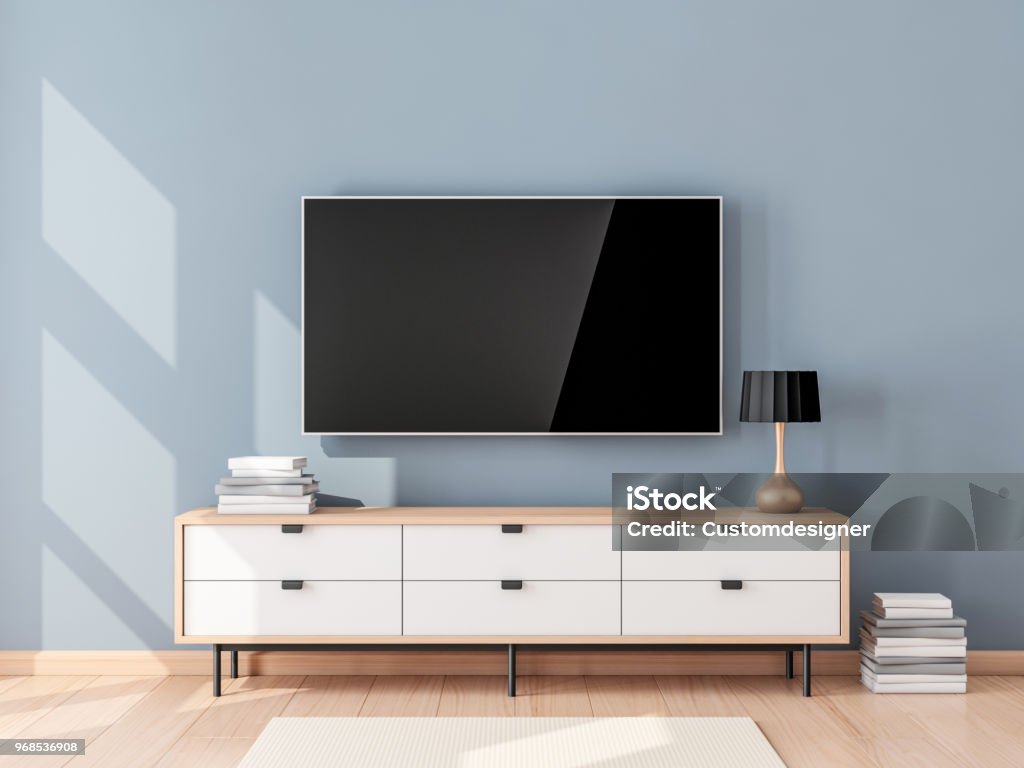 Smart Tv Mockup with blank screen hanging on the wall in modern living room Smart Tv Mockup with blank screen hanging on the wall in modern living room. 3d rendering Television Set Stock Photo