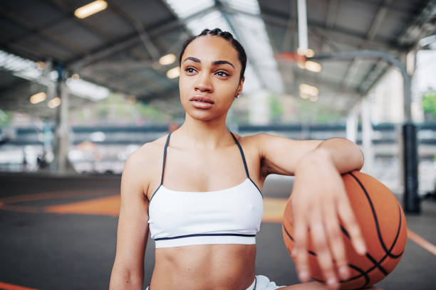 istock Young female outstanding basketball player 968549206