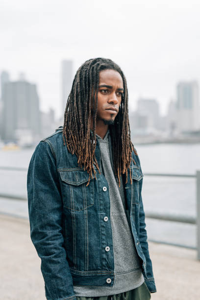 istock Portrait of serious man on rainy day 968554482