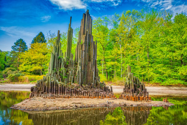 thin rock spires near the Devil's Bridge (Rakotzbrücke) in Kromlau, Germany