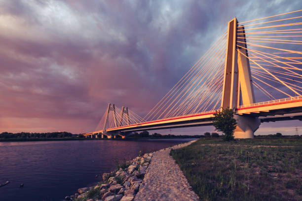 istock Cable stayed bridge, Krakow, Poland, during sunset over Vistula river 968591198