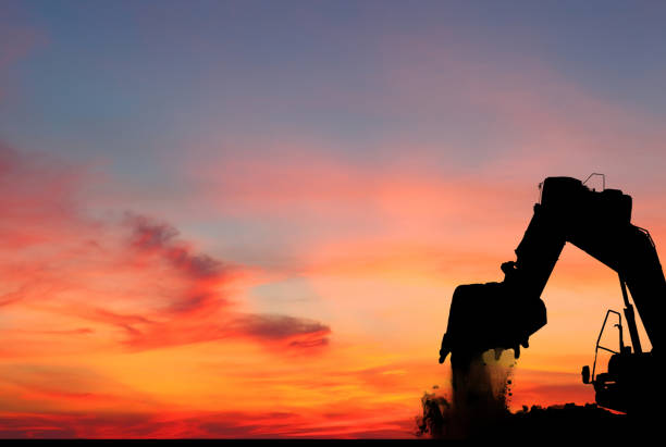istock silhouette of Excavator 968597264