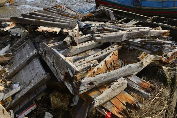 istock Broken wooden boats in the river 968602488