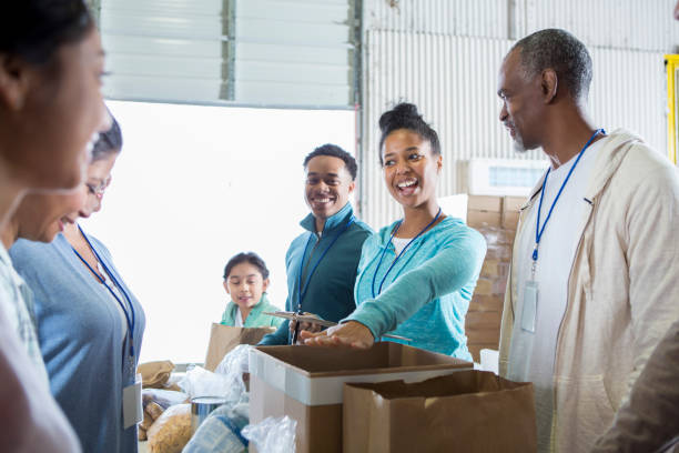 istock Cheerful volunteers during food drive 968605954