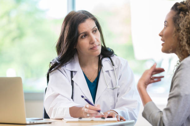 istock Compassionate doctor listens patient 968608472