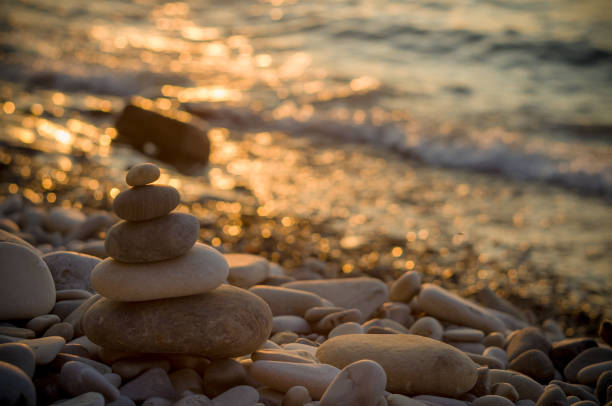 istock stack of zen stones on pebble beach 968616324