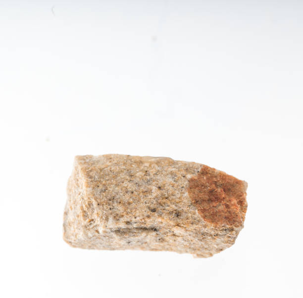 istock quartz sandstone mineral sample studio shot with white background 968616414