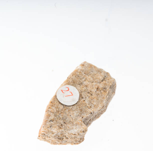 istock quartz sandstone mineral sample studio shot with white background 968616440