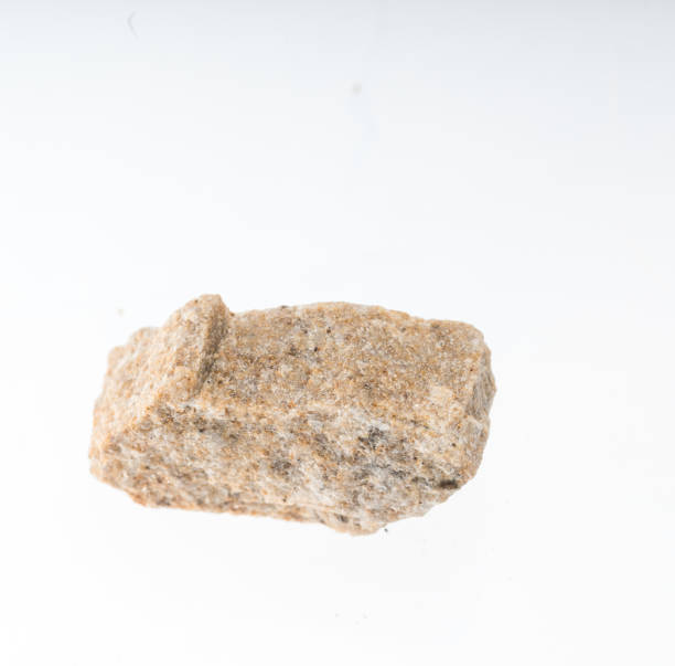 istock quartz sandstone mineral sample studio shot with white background 968616450