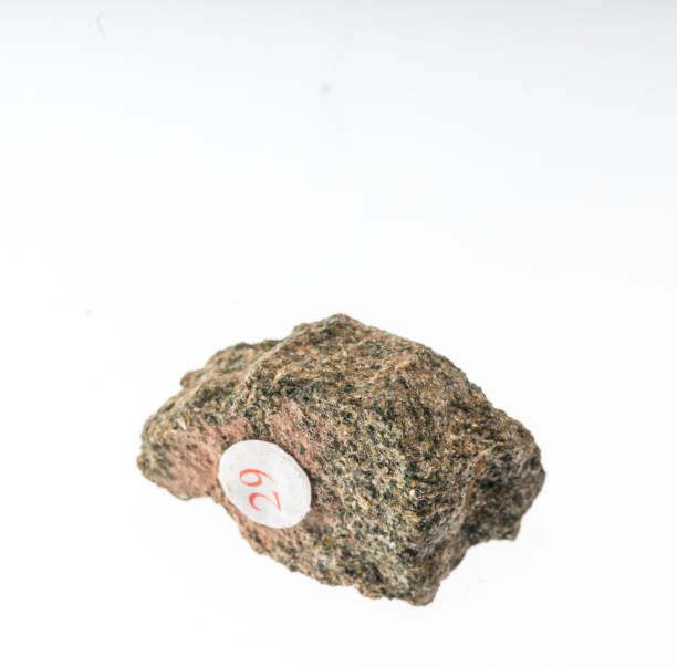istock glauconite sandstone mineral sample studio shot with white background 968616546