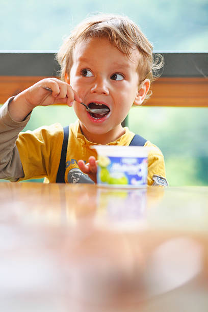 istock Little Boy Is Eating Yogurt. 96863513