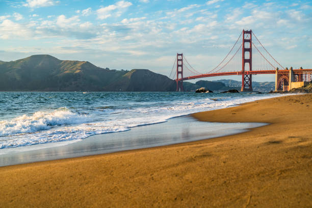 istock Golden Hour Sunset Perfect timing at Golden Gate Bridge view from Sandy Beach along Pacific Northwest Coast 968637036