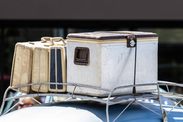istock Vintage luggage and cooler in a car rack 968642790
