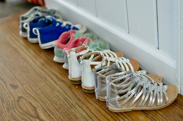 istock Children's shoes in a row 968659928