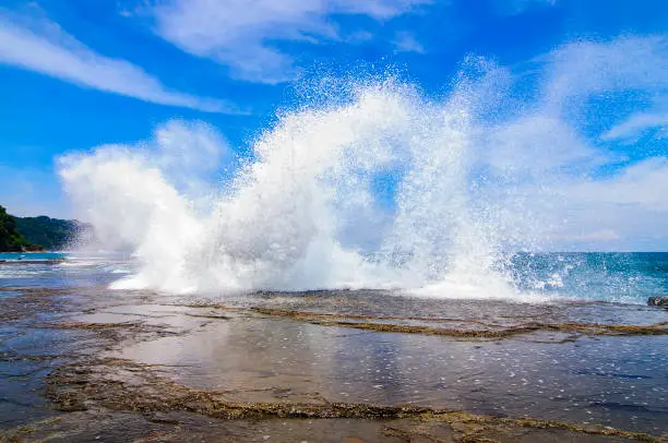 waves crashing against the shore in Costa Rica