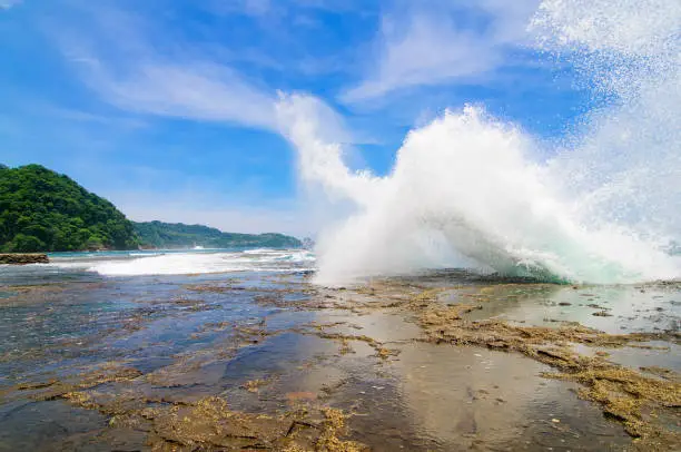 waves crashing against the shore in Costa Rica