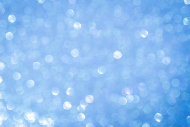 istock blue blur abstract background. bokeh christmas blurred beautiful shiny Christmas lights. 968679840