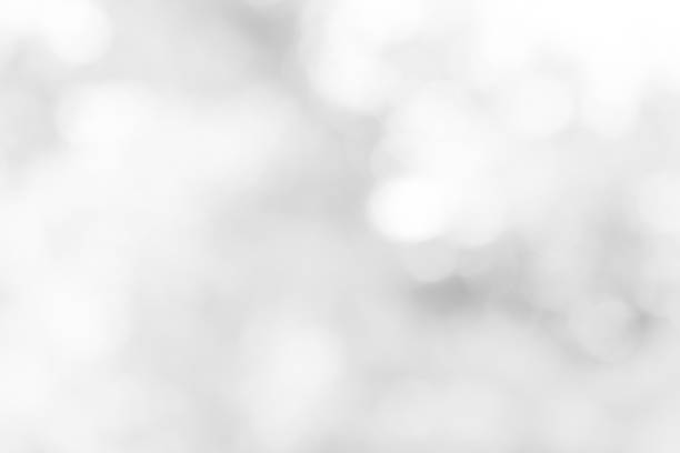istock white blurred backdrop of nature, circle white wallpaper, gray bokeh background 968680032