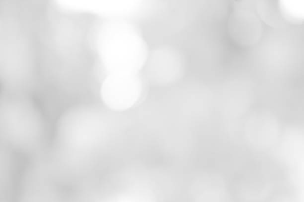 istock white blurred backdrop of nature, circle white wallpaper, gray bokeh background 968680254