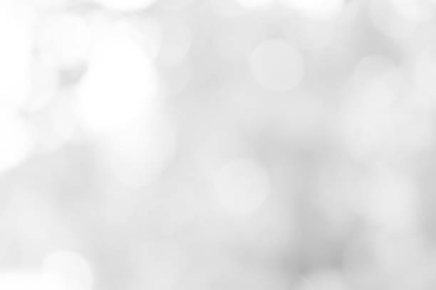 istock white blurred backdrop of nature, circle white wallpaper, gray bokeh background 968682508
