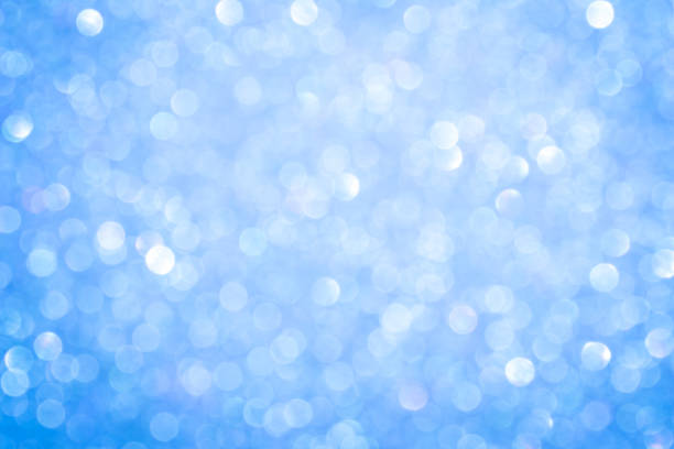 istock blue blur abstract background. bokeh christmas blurred beautiful shiny Christmas lights. 968682540