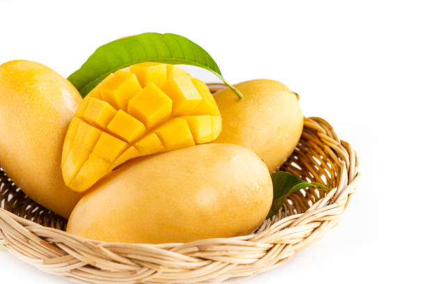 istock fresh Yellow mango Beautiful Skin In the basket isolate 968714354