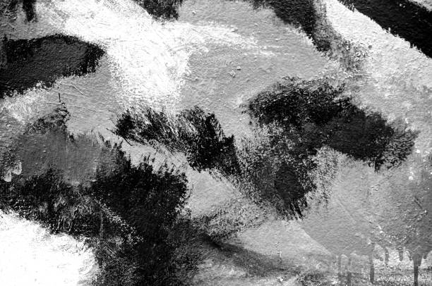 istock Abstract paint grey brush on wall background with kid. Acrylic hand painted with earth tone. Fashion and street. Black and white color. Close up. 968714440