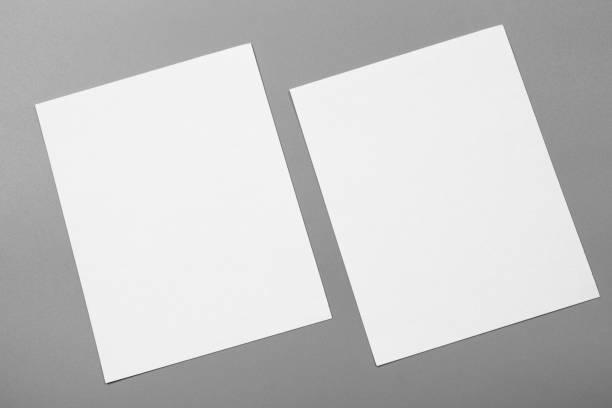 istock Blank portrait mock-up paper. brochure magazine isolated on gray, changeable background / white paper isolated on gray 968718944